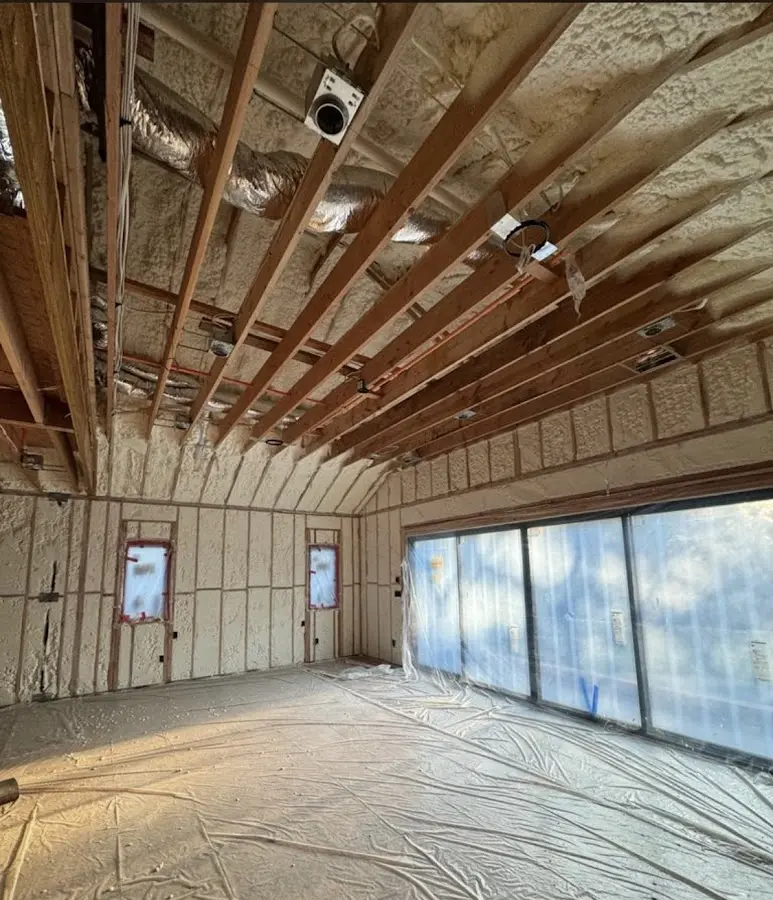Interior walls and ceiling insulated with spray foam during new construction in Kingsbury